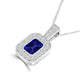 TMR121141 - Leah - Emerald Cut Tanzanite and Diamond Pendant Halo